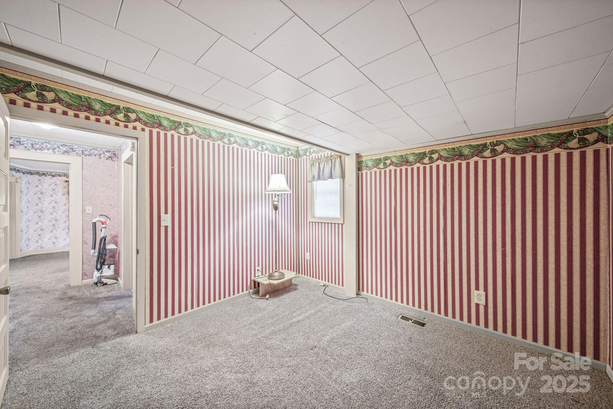 210 Smith Street Clover, SC 29710 - Photo 10 of 33 a view of a livingroom with a balcony
