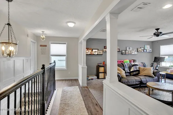 a bathroom with a toilet a sink and a shower