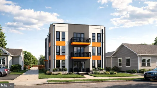 a front view of residential houses with street