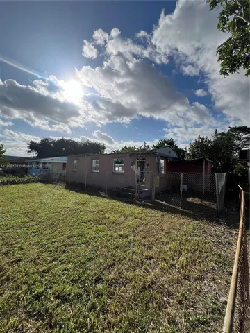a view of a terrace with a yard