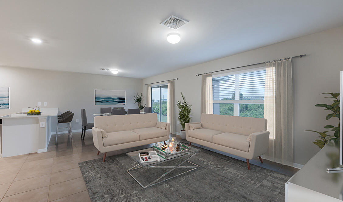 334 Flounder Street Crestview, FL 32539 - Photo 10 of 24 a living room with furniture and a large window
