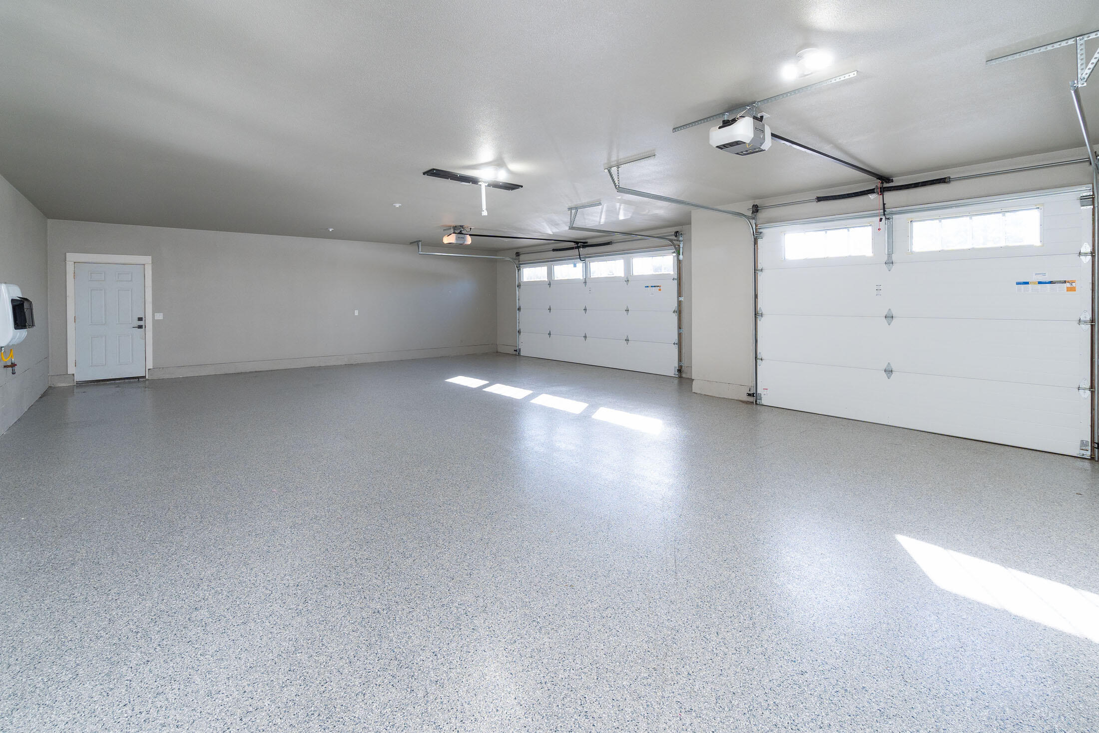 61151 Parrell Road Bend, OR 97702 - Photo 21 of 47 Heated 3 car garage with epoxy flooring