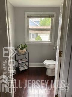 29 Plainfield Avenue Metuchen, NJ 08840 - Photo 10 of 11 a bathroom with a toilet a sink and a window