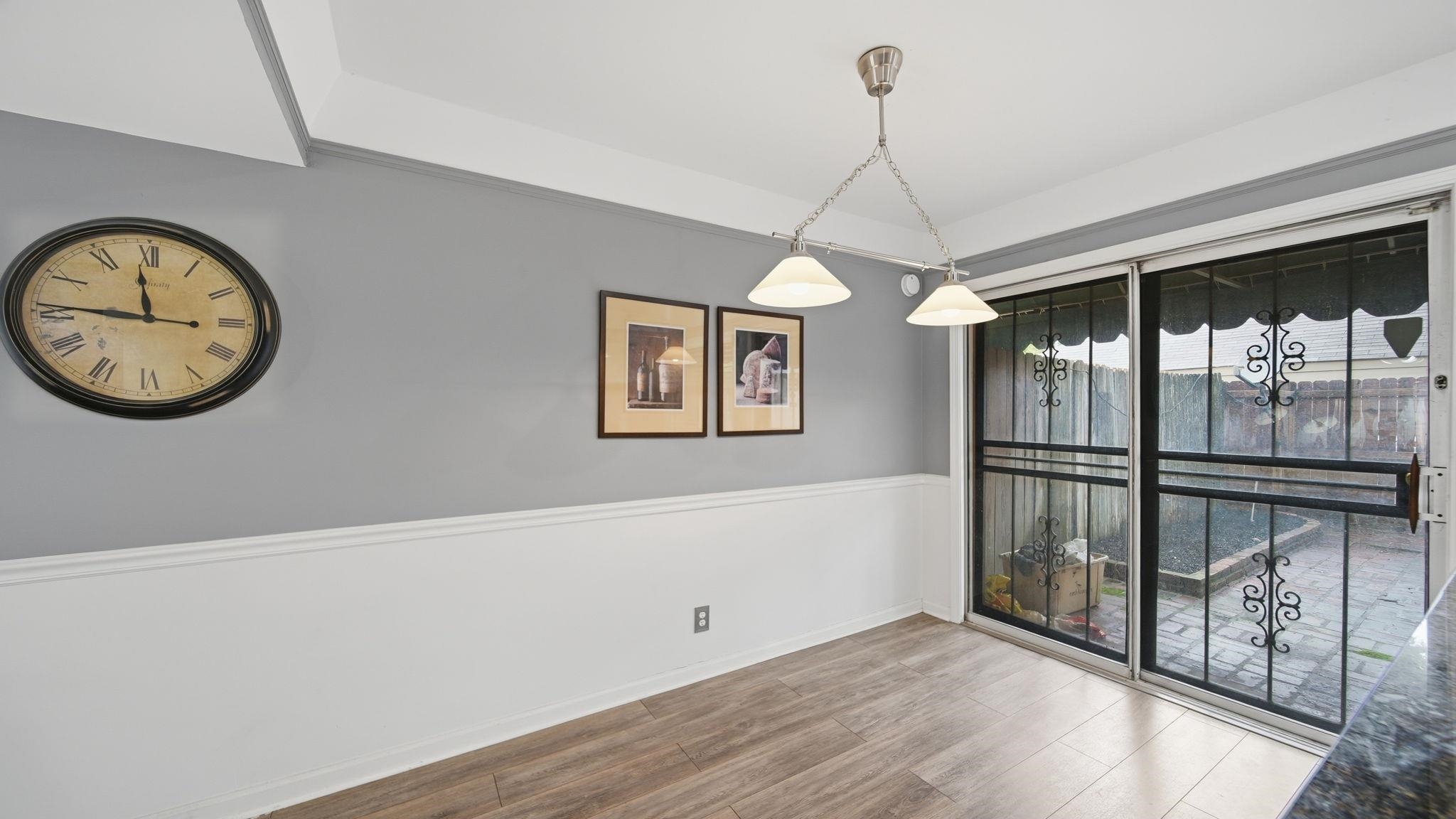 5866 Roxbury Drive, Unit 5866 Memphis, TN 38119 - Photo 6 of 20 Sliding glass door with security grilles opening to a private patio