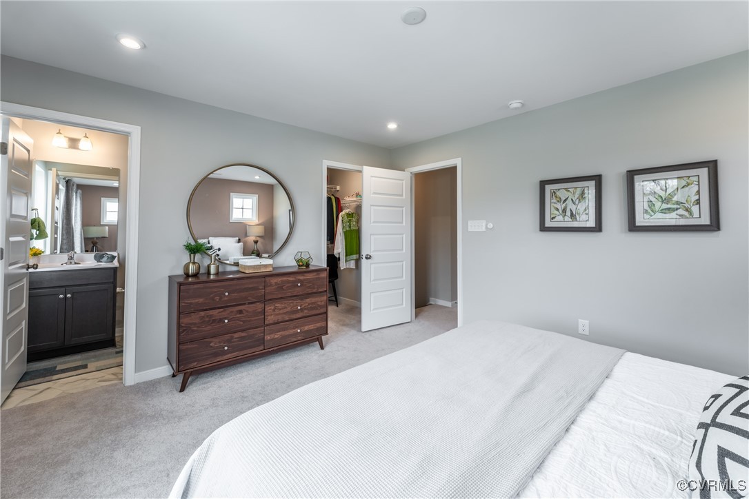 3413 Hopkins Road Richmond, VA 23234 - Photo 14 of 25 a bedroom with a bed and a dresser