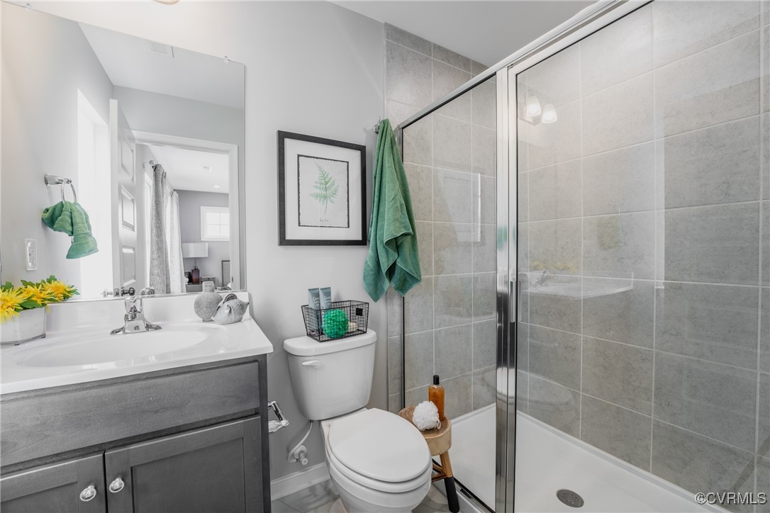 3413 Hopkins Road Richmond, VA 23234 - Photo 15 of 25 a bathroom with a sink toilet and shower