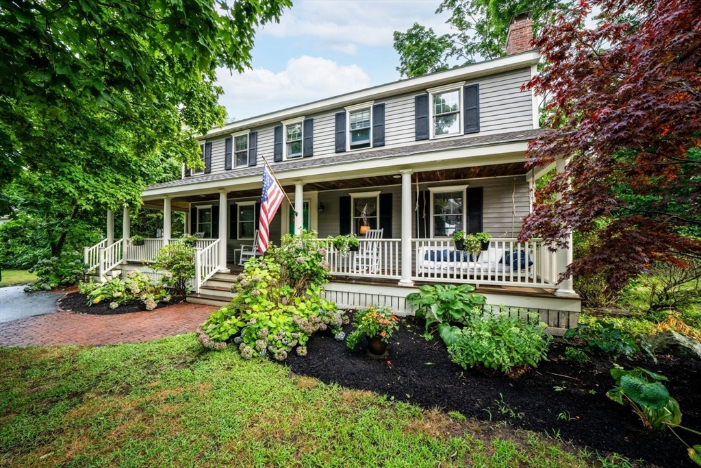 11 Sycamore Road Scituate, MA 02066 - Photo 1 of 39 a front view of a house with a yard and potted plants