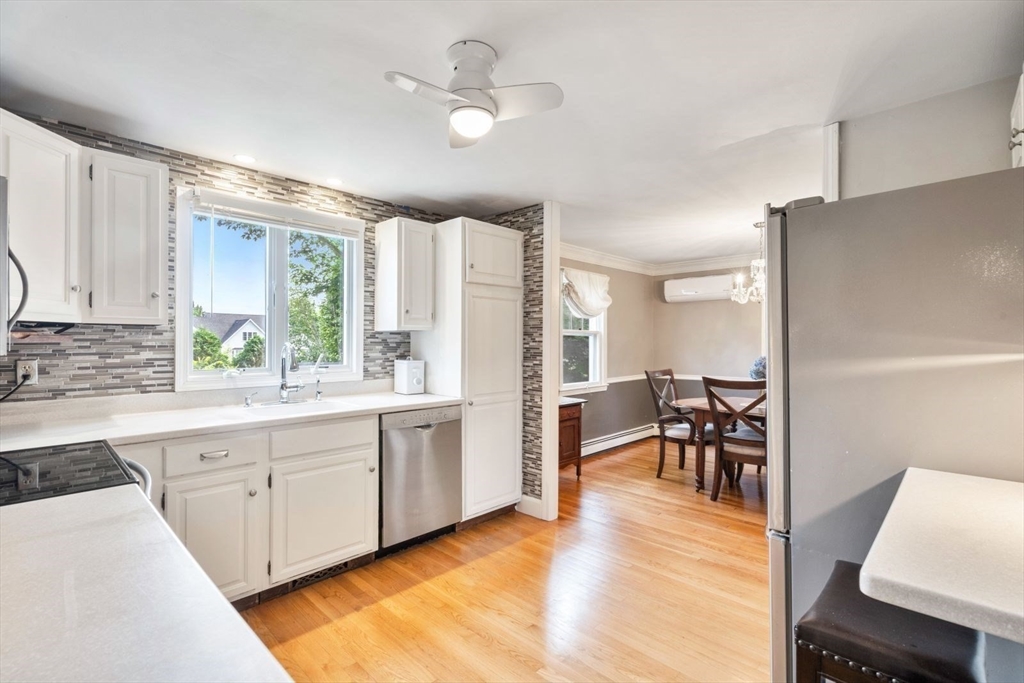 11 Sycamore Road Scituate, MA 02066 - Photo 13 of 39 a view of kitchen with sink and dining table chair