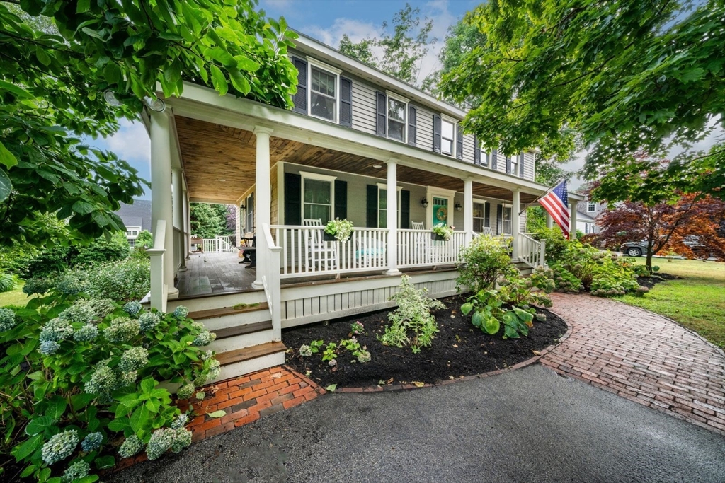 11 Sycamore Road Scituate, MA 02066 - Photo 2 of 39 a front view of a house with a garden
