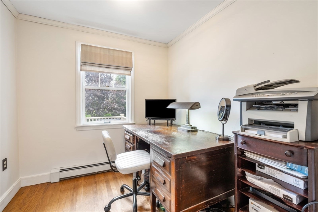 11 Sycamore Road Scituate, MA 02066 - Photo 22 of 39 a workspace with furniture and wooden floor