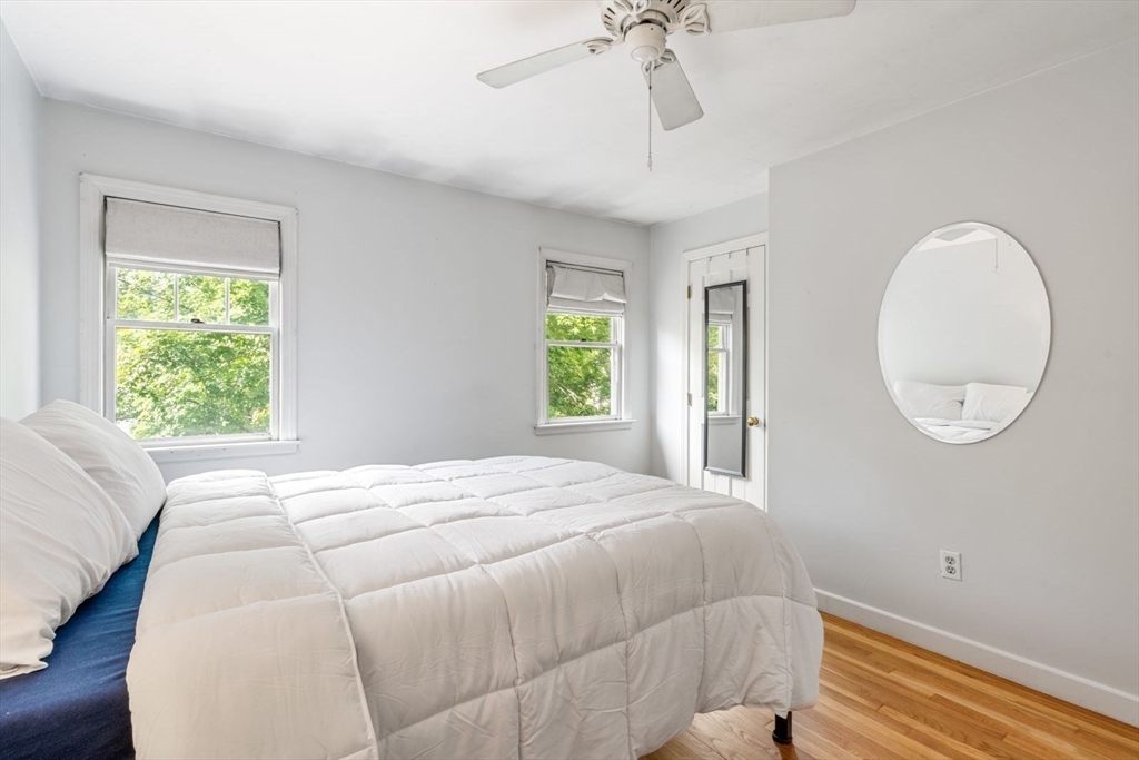 11 Sycamore Road Scituate, MA 02066 - Photo 34 of 39 a bedroom with a bed and a window