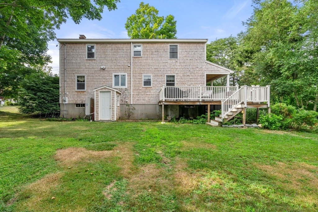 11 Sycamore Road Scituate, MA 02066 - Photo 37 of 39 a view of a house with backyard and garden