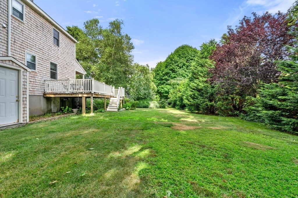 11 Sycamore Road Scituate, MA 02066 - Photo 39 of 39 a view of a house with a backyard