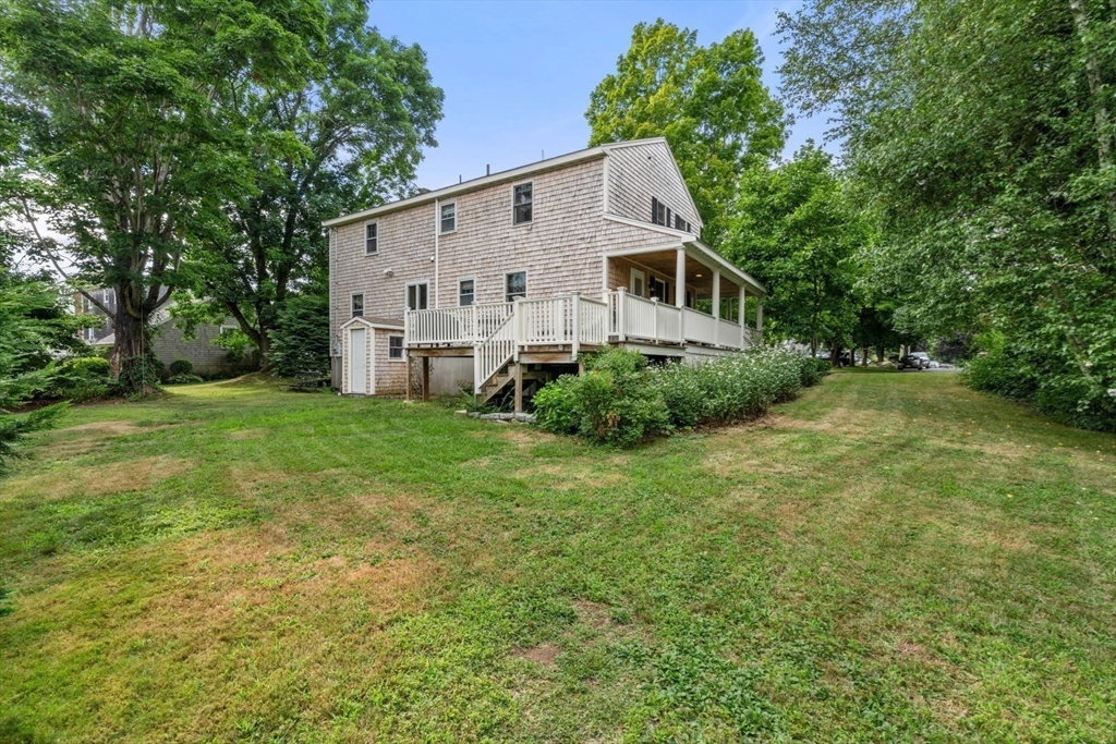 11 Sycamore Road Scituate, MA 02066 - Photo 7 of 39 a view of a house with backyard and garden