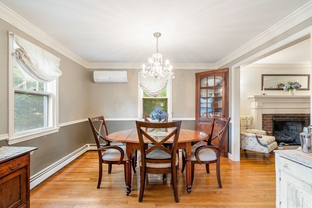 11 Sycamore Road Scituate, MA 02066 - Photo 8 of 39 a view of a dining room with furniture window and wooden floor
