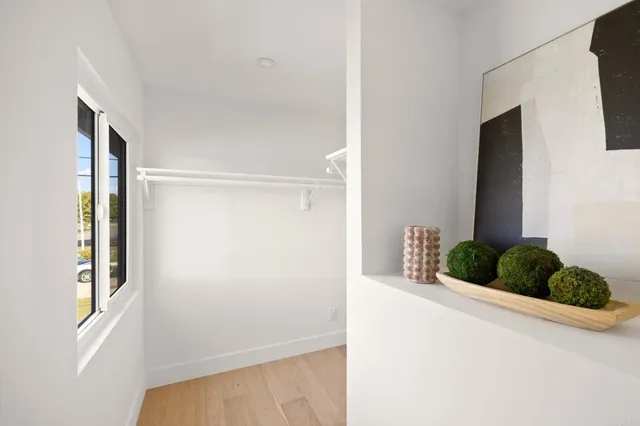 a room with window and closet