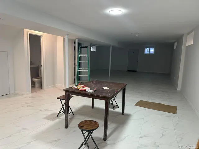 a room with furniture and window