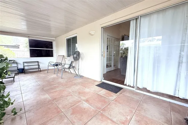 a view of livingroom with furniture and window