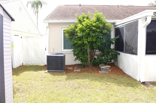 a view of a yard with an outdoor space