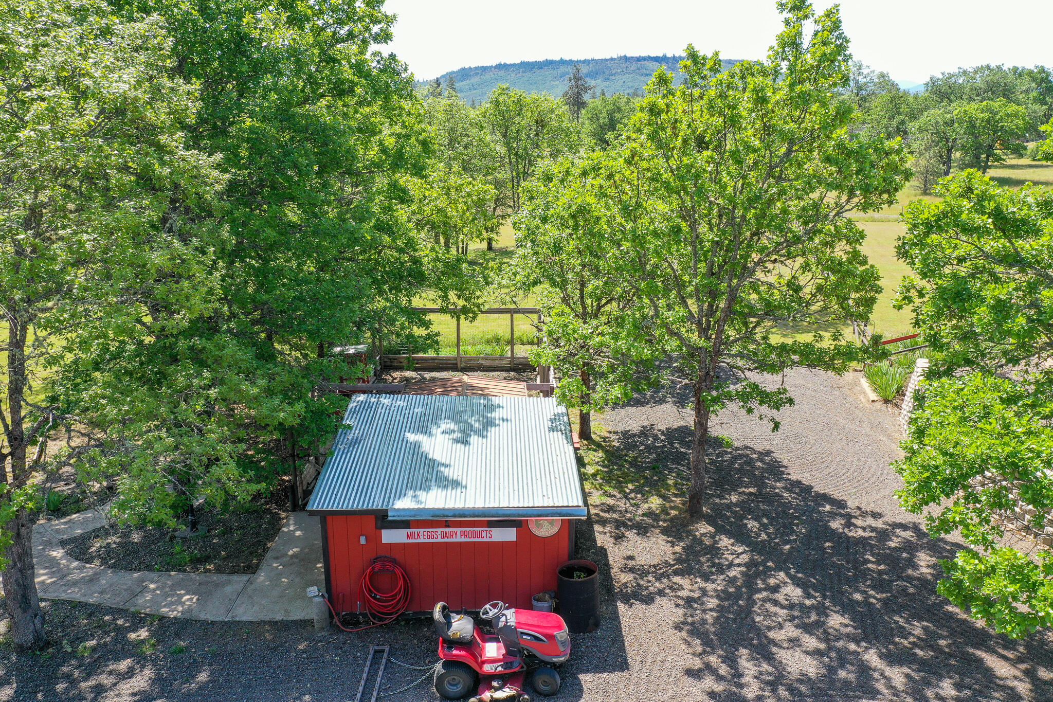 6297 Dodge Road White City, OR 97503 - Photo 38 of 45 an aerial view of a house with garden space and street view
