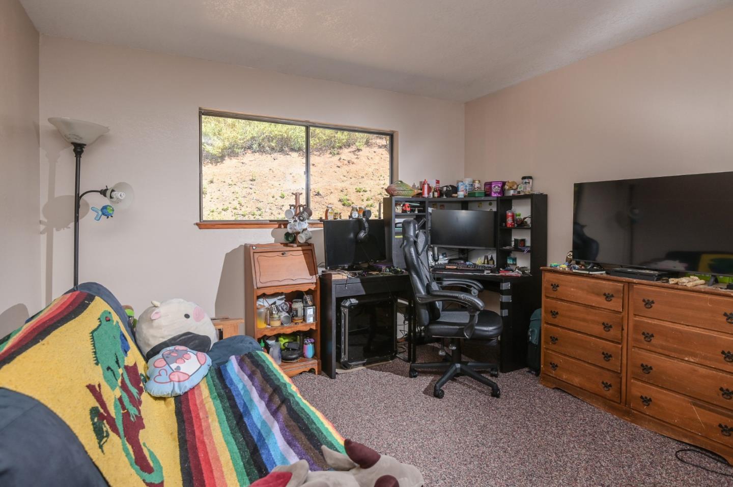 15223 Perry Lane Morgan Hill, CA 95037 - Photo 13 of 31 a view of a workspace with furniture and a window
