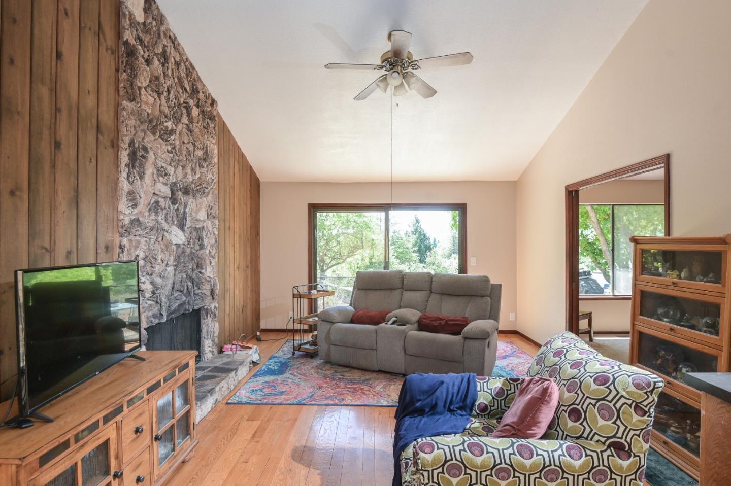 15223 Perry Lane Morgan Hill, CA 95037 - Photo 21 of 31 a living room with furniture and a flat screen tv