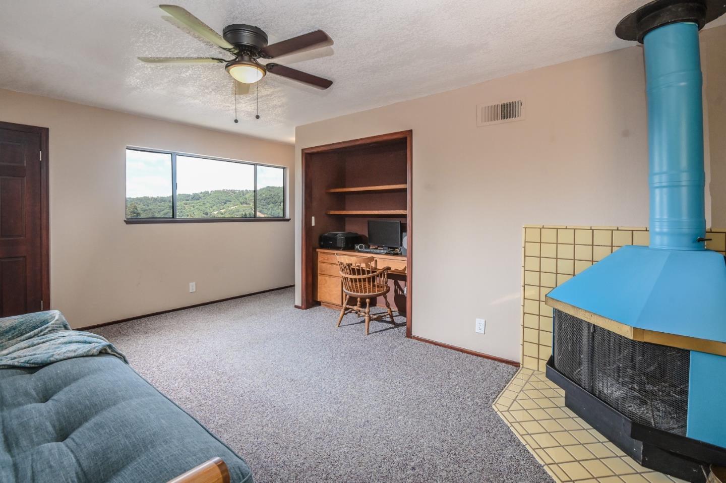 15223 Perry Lane Morgan Hill, CA 95037 - Photo 22 of 31 a living room with furniture and a window