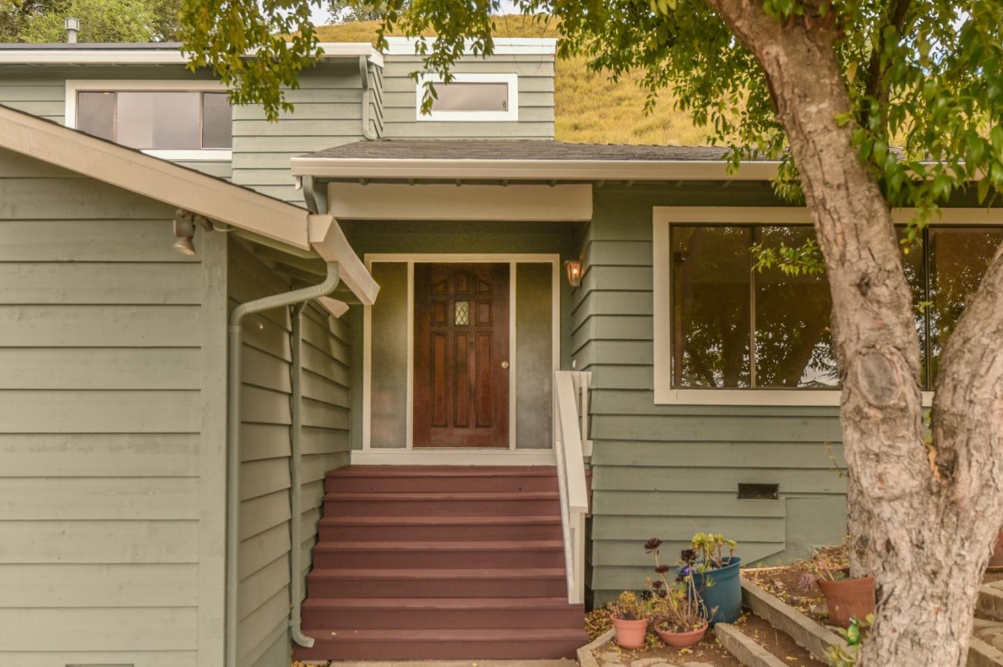 15223 Perry Lane Morgan Hill, CA 95037 - Photo 3 of 31 a view of a house with a window and wooden door