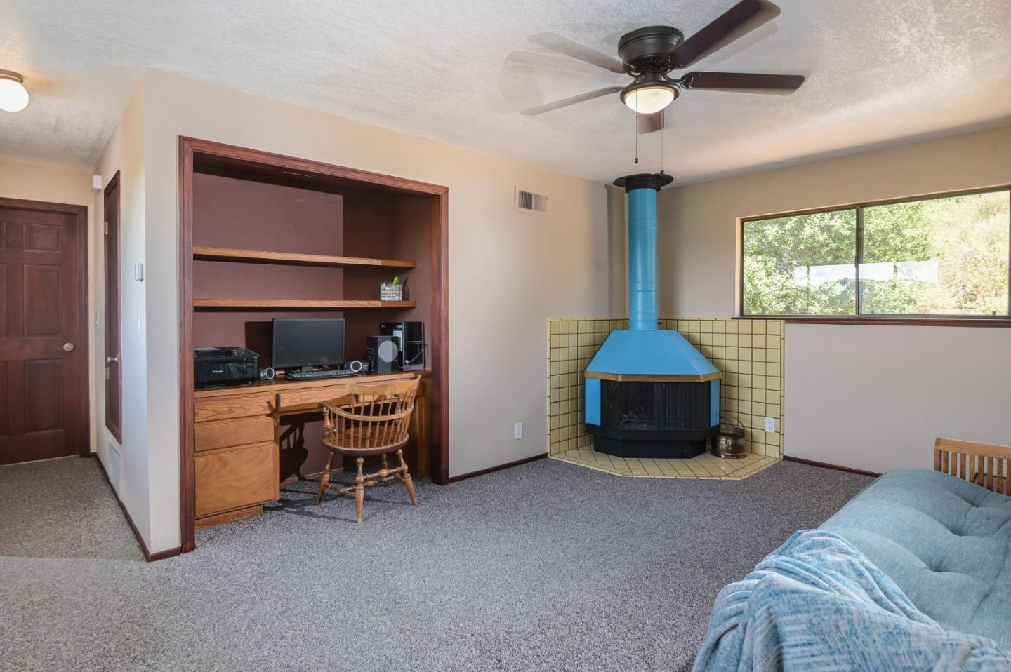 15223 Perry Lane Morgan Hill, CA 95037 - Photo 9 of 31 a living room with furniture and a window