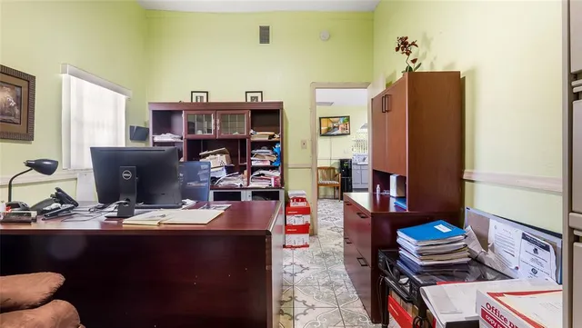 a living room with furniture and a window