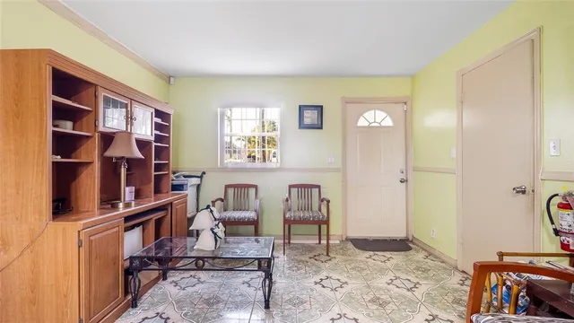 a view of a livingroom with furniture and toys