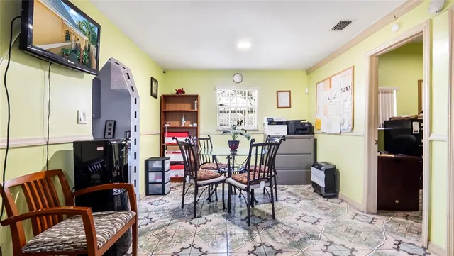 a view of a dining room with furniture