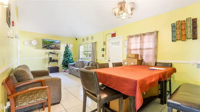 a bedroom with a bed and a table