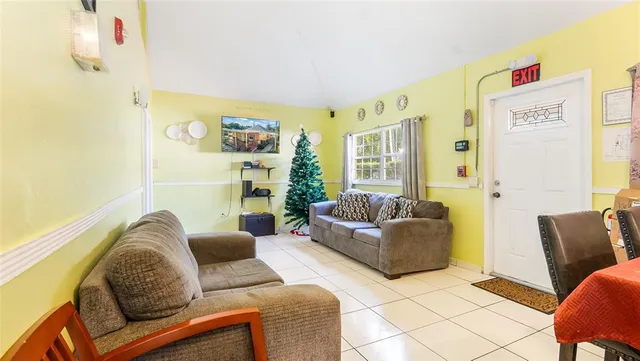 a living room with furniture and a couch