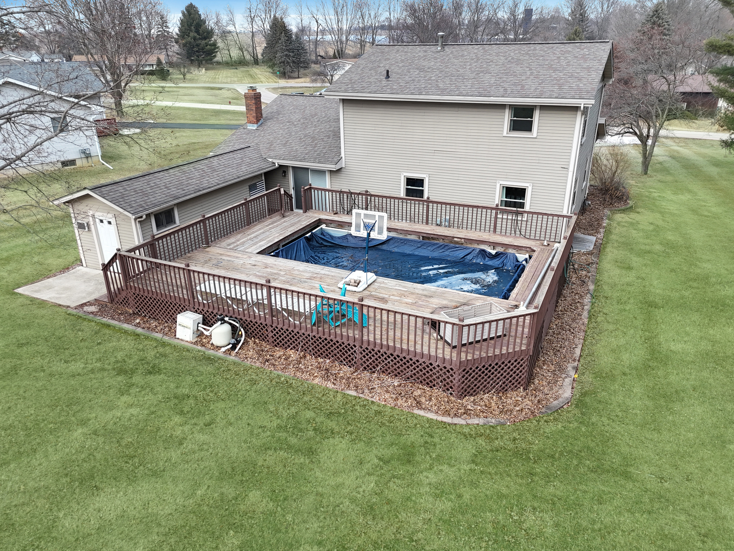 1419 Finch Street Freeport, IL 61032 - Photo 3 of 30 a view of a backyard with a deck and a garden