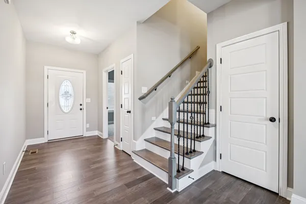 a view of entryway with wooden floor