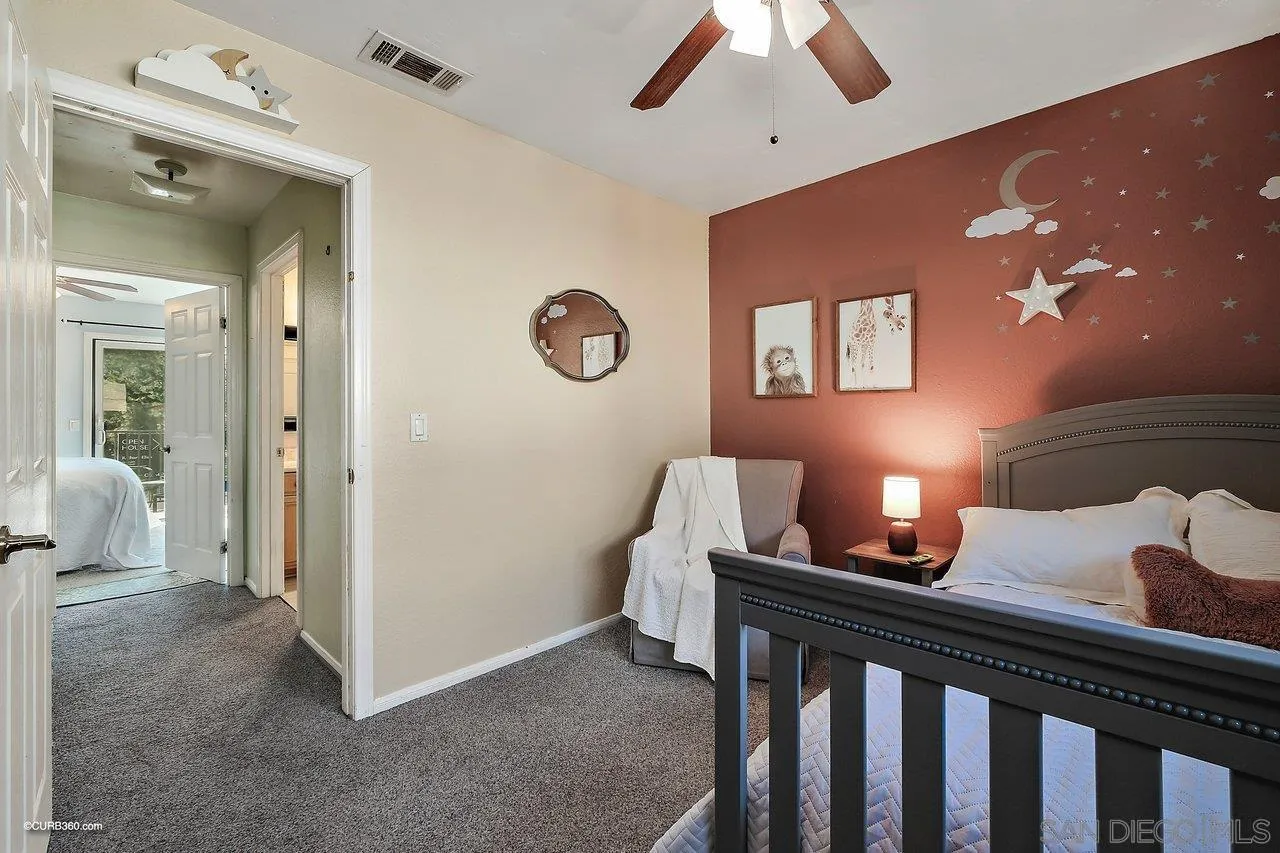 2648 Alpine Boulevard, Unit B Alpine, CA 91901 - Photo 13 of 25 a bedroom with furniture and wooden floor