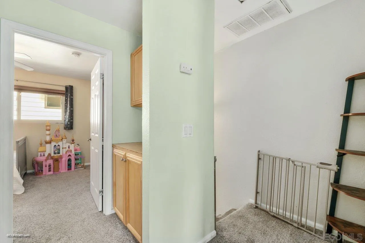 2648 Alpine Boulevard, Unit B Alpine, CA 91901 - Photo 16 of 25 a view of a room with baby toys