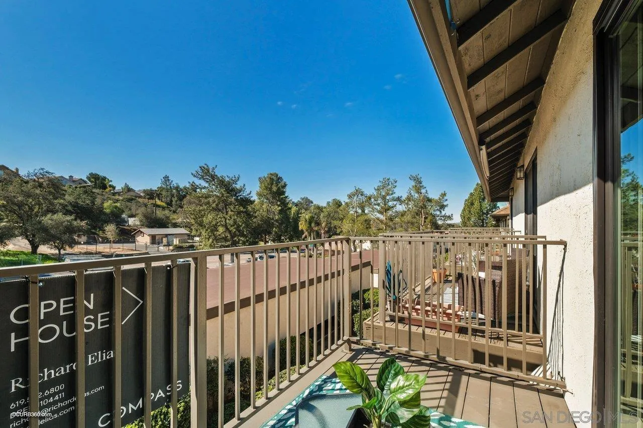 2648 Alpine Boulevard, Unit B Alpine, CA 91901 - Photo 22 of 25 a view of a balcony with wooden fence and floor