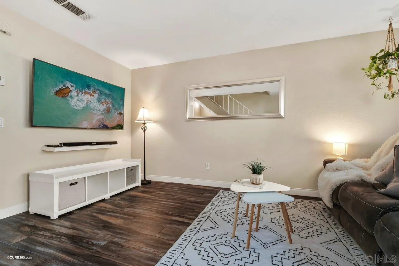 2648 Alpine Boulevard, Unit B Alpine, CA 91901 - Photo 3 of 25 a living room with furniture and a flat screen tv