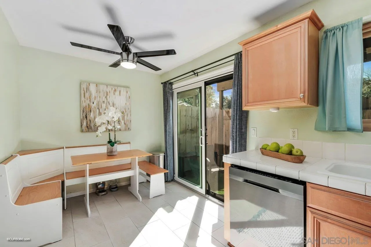 2648 Alpine Boulevard, Unit B Alpine, CA 91901 - Photo 10 of 25 a spacious bedroom with a bed and a chandelier