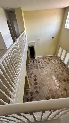 a view of a livingroom with furniture
