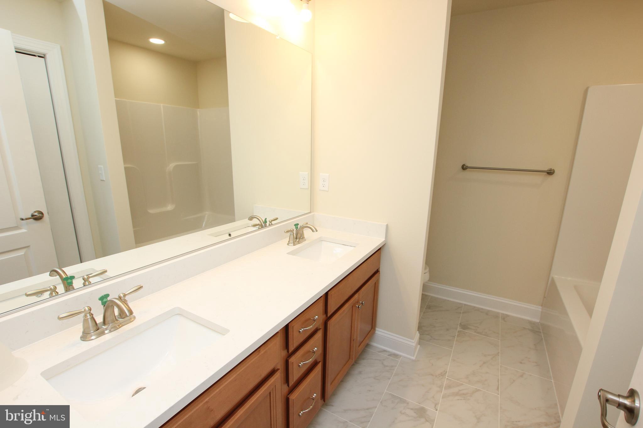 303 Concord Road Seaford, DE 19973 - Photo 14 of 40 Primary bathroom on 1st floor