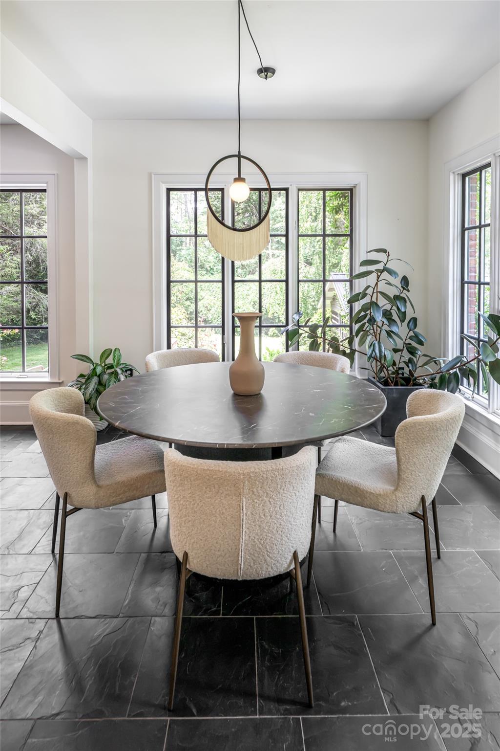 3 Lone Pine Road Biltmore Forest, NC 28803 - Photo 14 of 47 a view of a dining room with furniture window and outside view