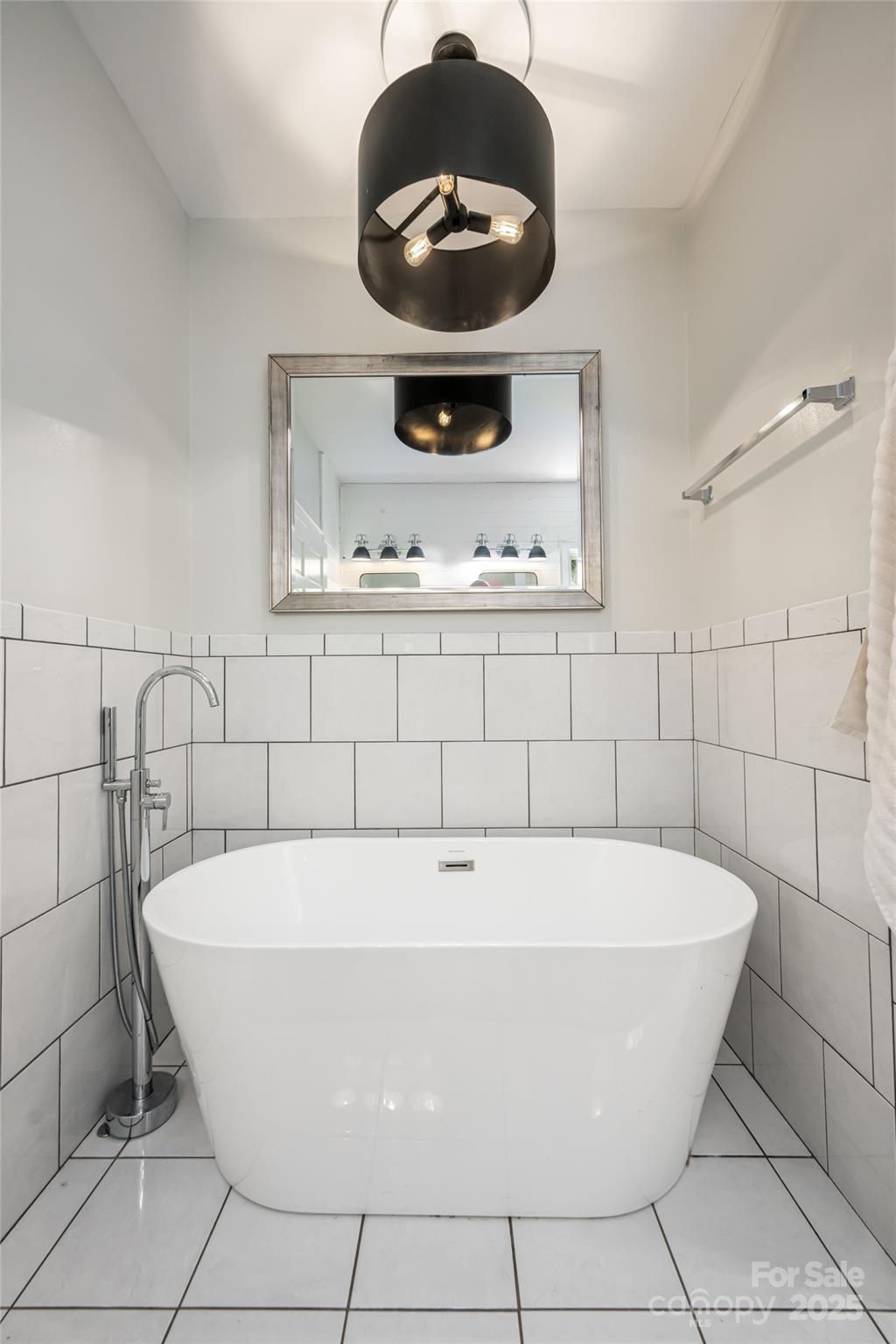 3 Lone Pine Road Biltmore Forest, NC 28803 - Photo 19 of 47 a bathroom with a bathtub and a sink