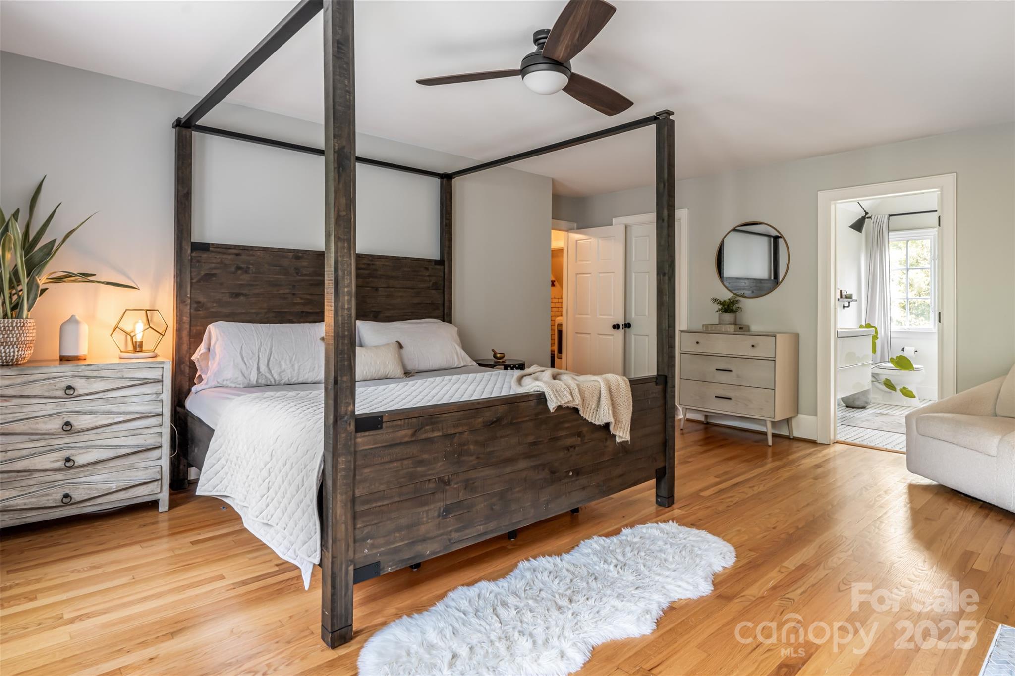 3 Lone Pine Road Biltmore Forest, NC 28803 - Photo 20 of 47 a bedroom with a bed and a mirror