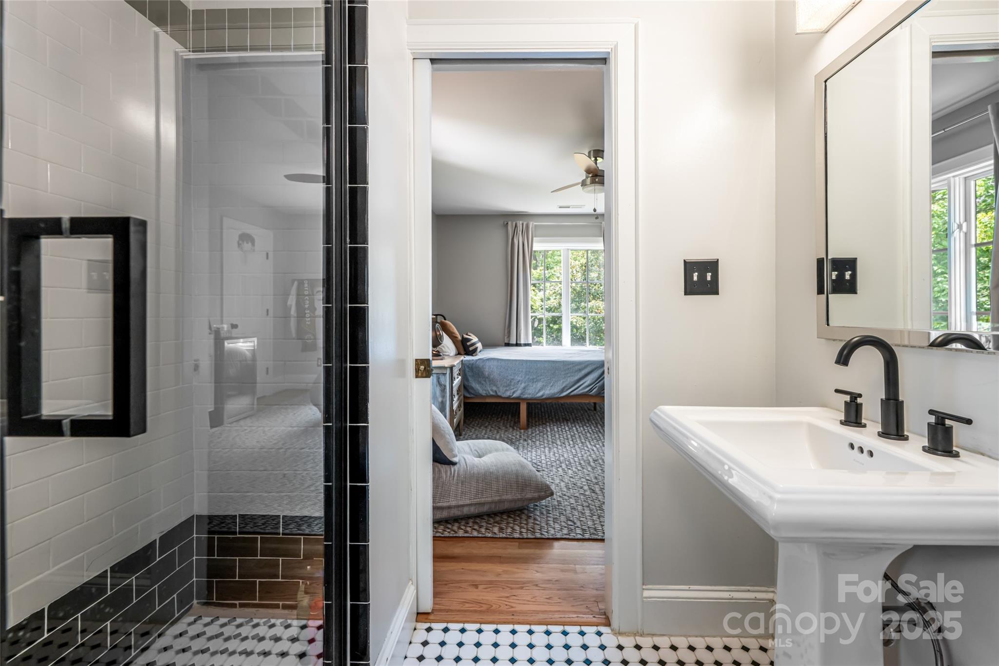 3 Lone Pine Road Biltmore Forest, NC 28803 - Photo 26 of 47 a en suite bathroom with a sink and a mirror