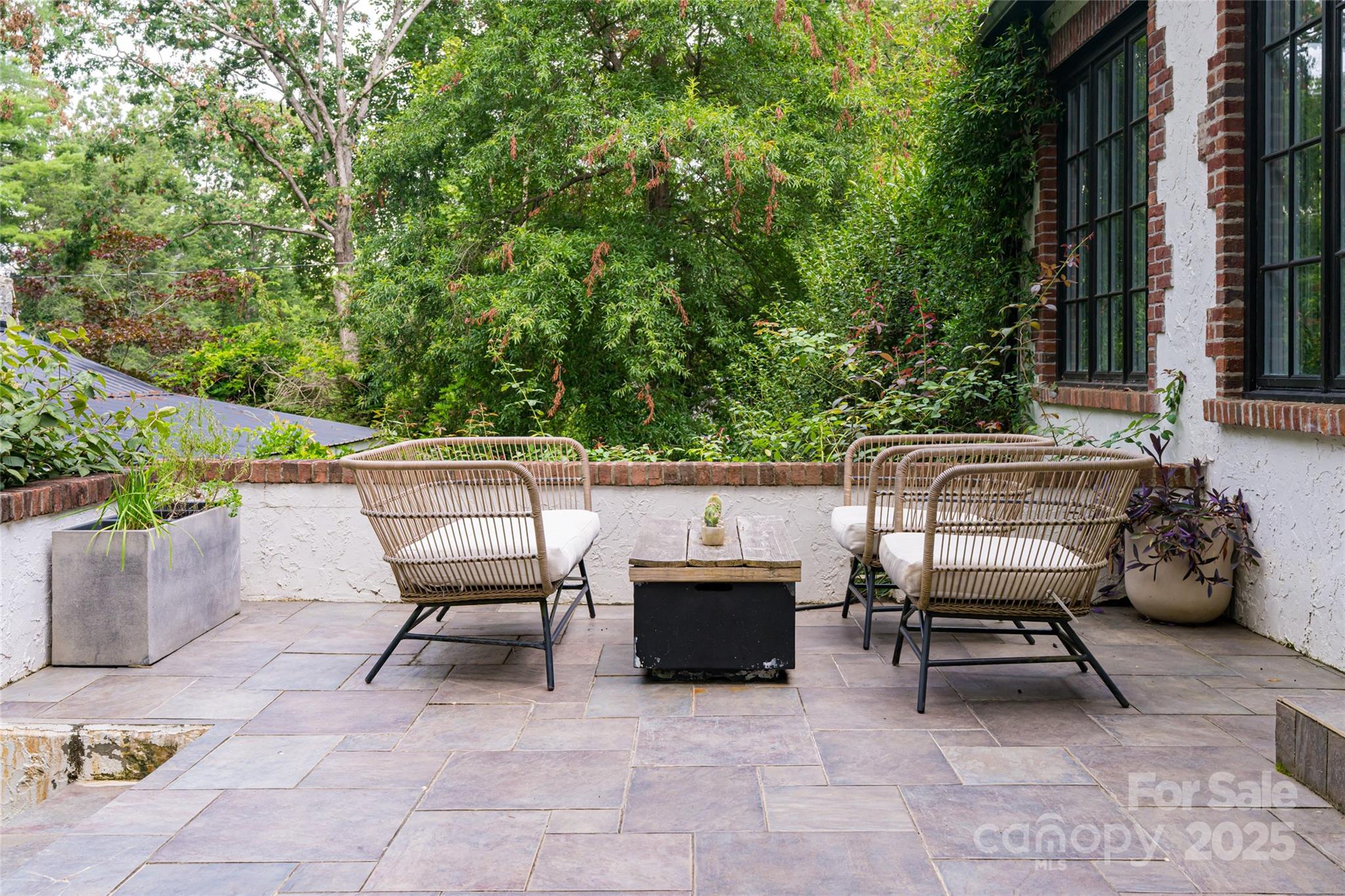 3 Lone Pine Road Biltmore Forest, NC 28803 - Photo 29 of 47 a roof deck with table and chairs and potted plants
