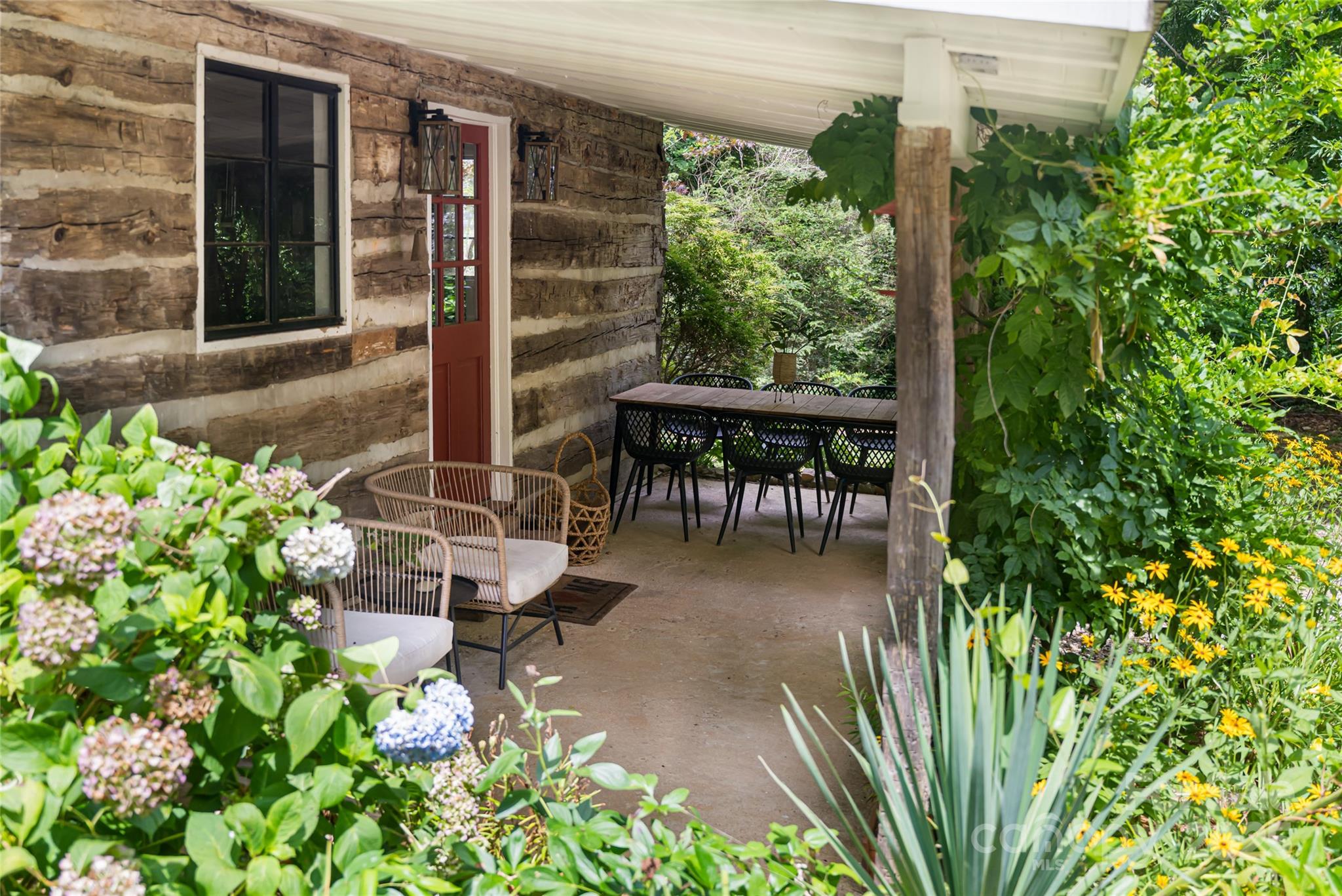 3 Lone Pine Road Biltmore Forest, NC 28803 - Photo 33 of 47 a view of a patio with table and chairs and potted plants