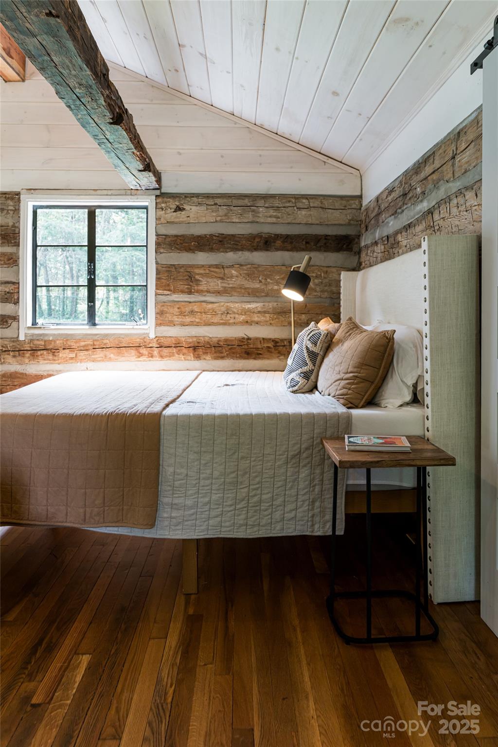 3 Lone Pine Road Biltmore Forest, NC 28803 - Photo 39 of 47 a bedroom with a bed and wooden floor